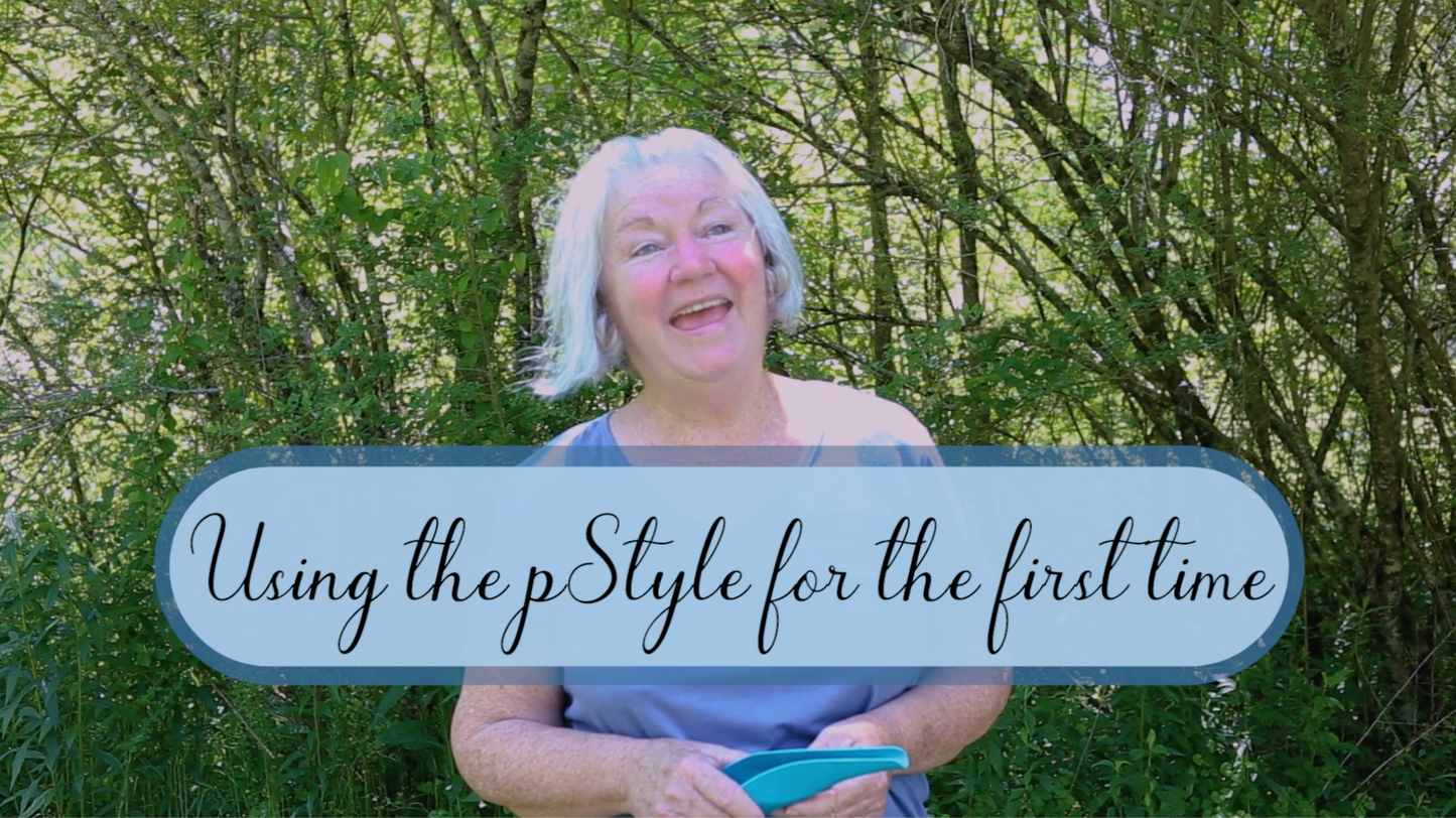 Shows people from the waist up successfully using a stand-to-pee device for the first time.